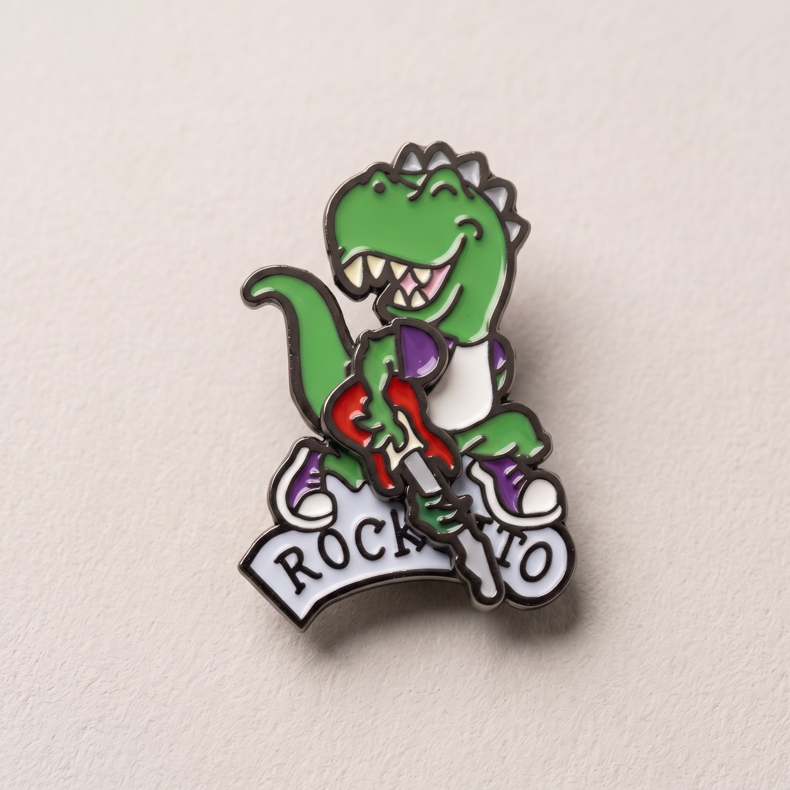 Pin Dinosaurio – Tu Rockcito